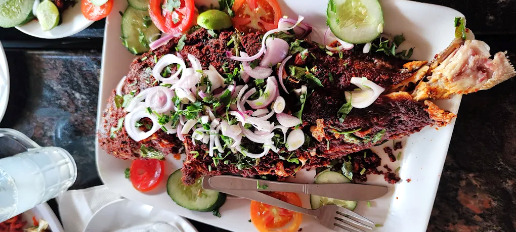 Fresh seafood dishes at Bambino Beach Restaurant